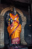 The great Chola temples of Tamil Nadu - The Brihadishwara Temple of Thanjavur. Deities on  the eastern entrance porch of the temple mandapa. 